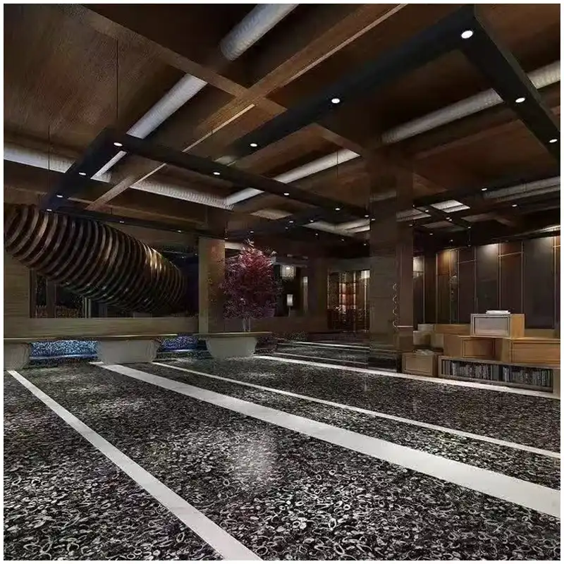 Fossil Black Marble hotel lobby flooring design with dark natural stone and pale fossils