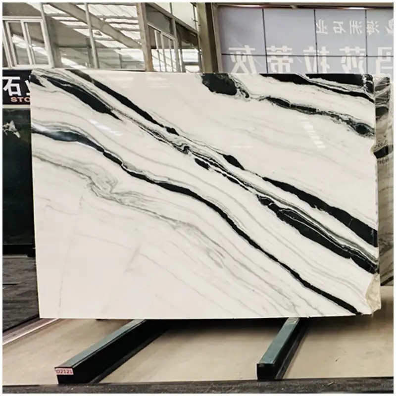 Chinese-Panda-White-Marble-Slabs Esta Stone Chinese Panda White Marble slab with wide black flow lines on polished white surface for luxury slabs.