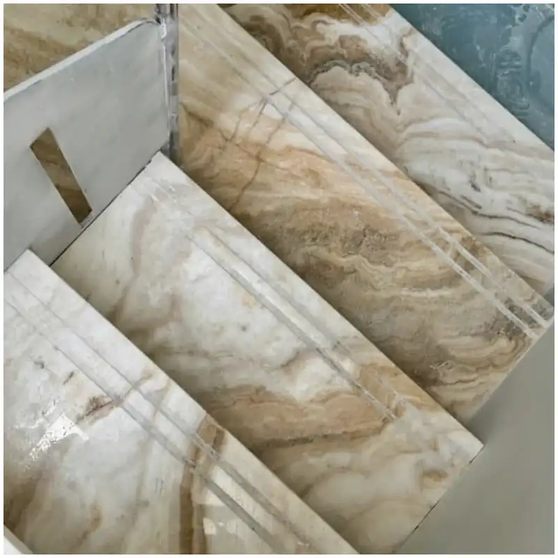 Persia White Onyx staircase application for luxury interiors Persia White Onyx staircase project with pale translucent natural stone steps and interior detailing