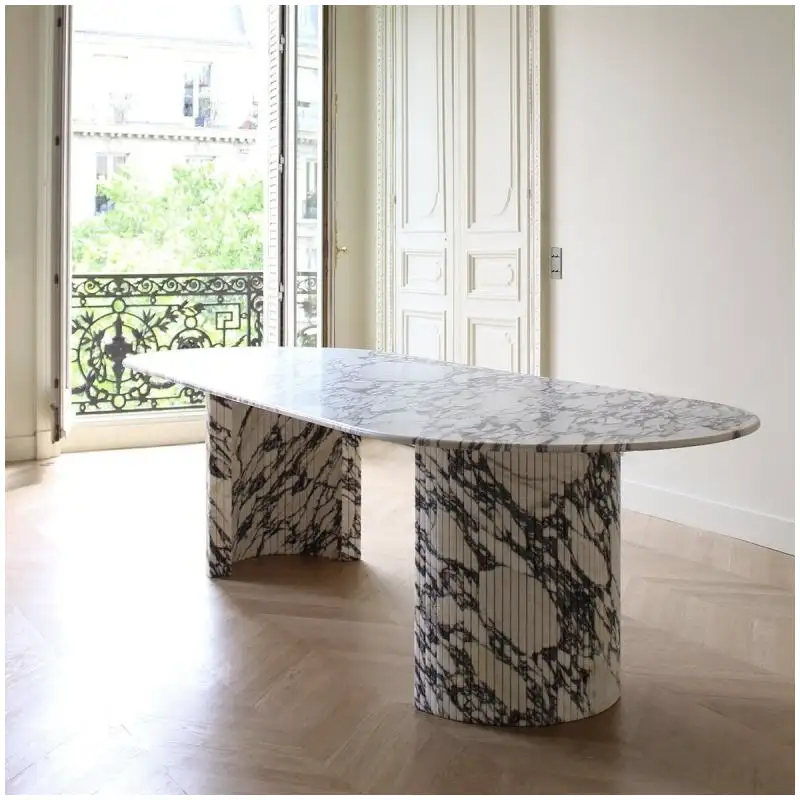 Calacatta Viola Marble table for apartment interiors with polished oval stone tabletop and rich veining
