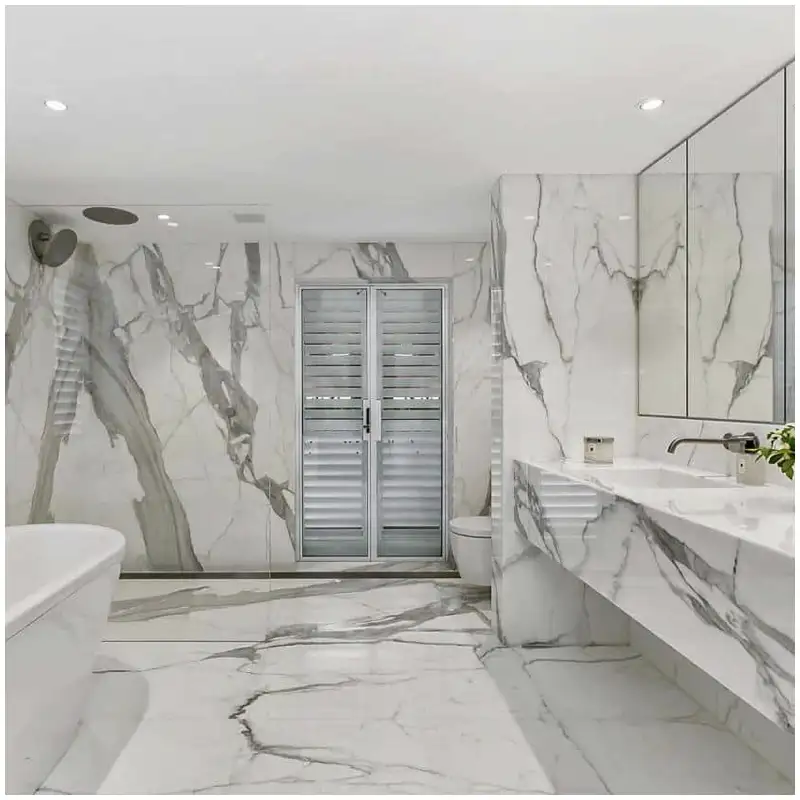 Calacatta-Marble-Bathroom-Walls-When-Dramatic-Veining-Works-and-When-It-Feels-Too-Busy Calacatta-Marble-Bathroom-Walls-When-Dramatic-Veining-Works-and-When-It-Feels-Too-Busy