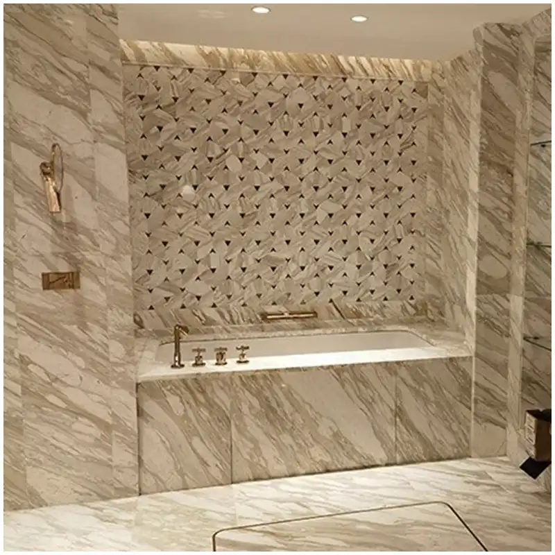 Calacatta Gold shower walls dry laid with vein direction niche corners and warm lighting marked Calacatta Gold shower walls dry laid with vein direction niche corners and warm lighting marked
