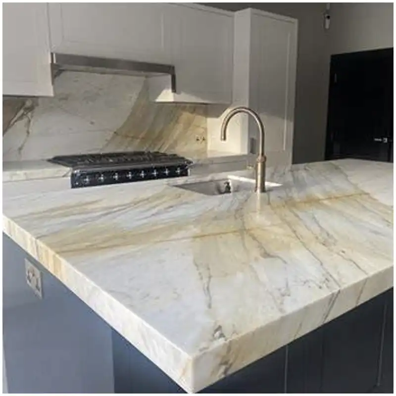 Calacatta Macchia Vecchia vs Calacatta Gold full slabs under neutral warehouse lighting Calacatta Macchia Vecchia vs Calacatta Gold full slabs under neutral warehouse lighting