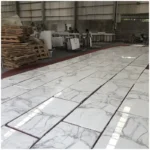 Calacatta Marble Floor Tile Dry-Lay before Cutting Borders and Doorways