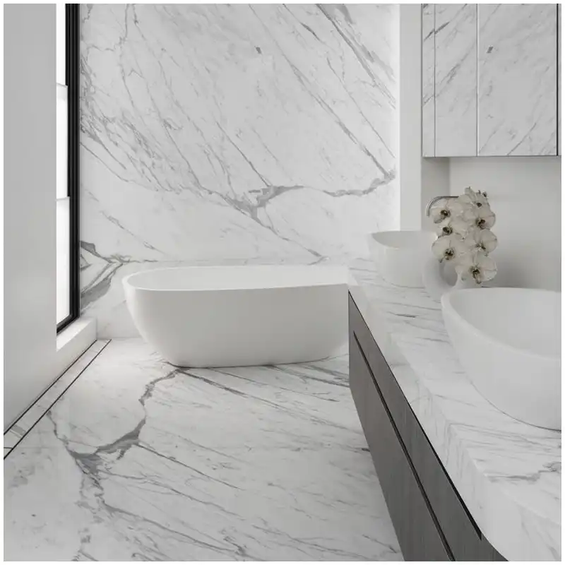 Calacatta Statuario vs Calacatta Gold slabs compared under 3000K and 4000K bathroom lighting Calacatta Statuario vs Calacatta Gold slabs compared under 3000K and 4000K bathroom lighting