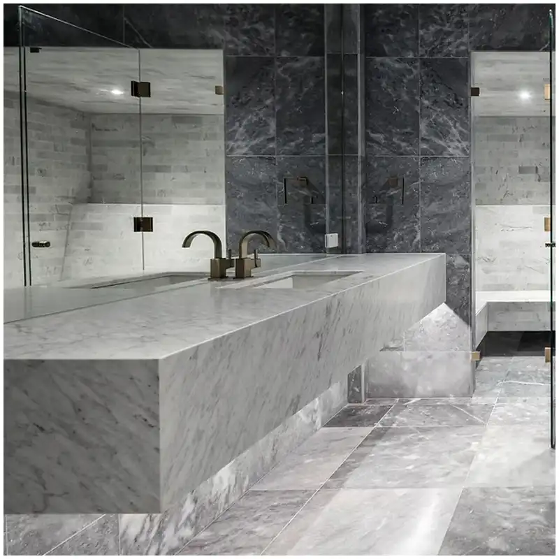 Carrara marble slab grades compared by background tone vein density clouding repairs dimensions and finish under warehouse light