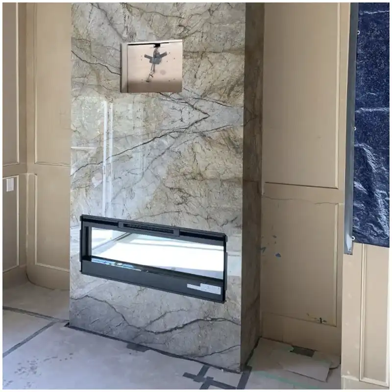 Normandy Grey Marble fireplace wall design with grey marble slabs and charcoal veins
