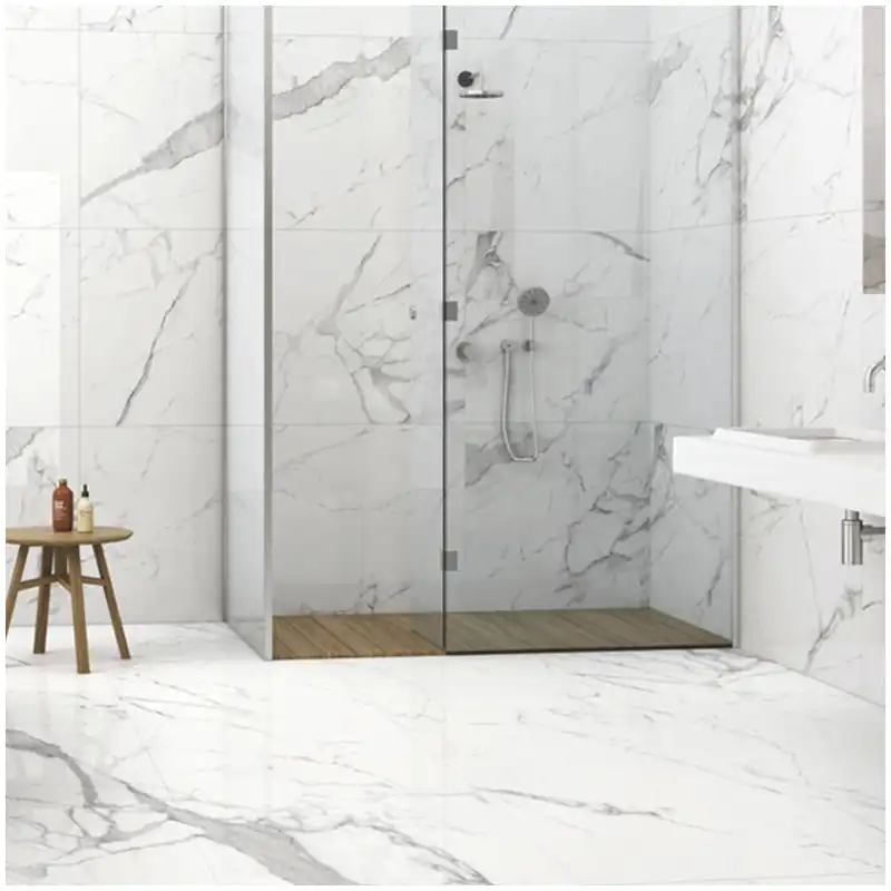 Statuario marble shower walls dry lay with niche returns corner panels shelf slope joints and warm lighting Statuario marble shower walls dry lay with niche returns corner panels shelf slope joints and warm lighting