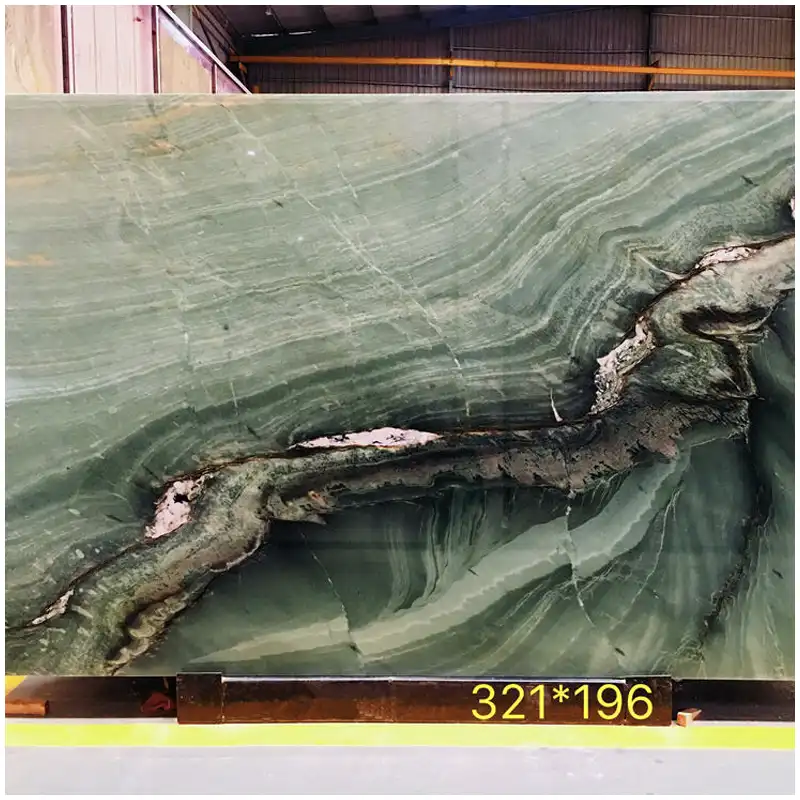 Verde Maestro Quartzite Verde Maestro Quartzite slab with layered green background and white grey dragon vein movement