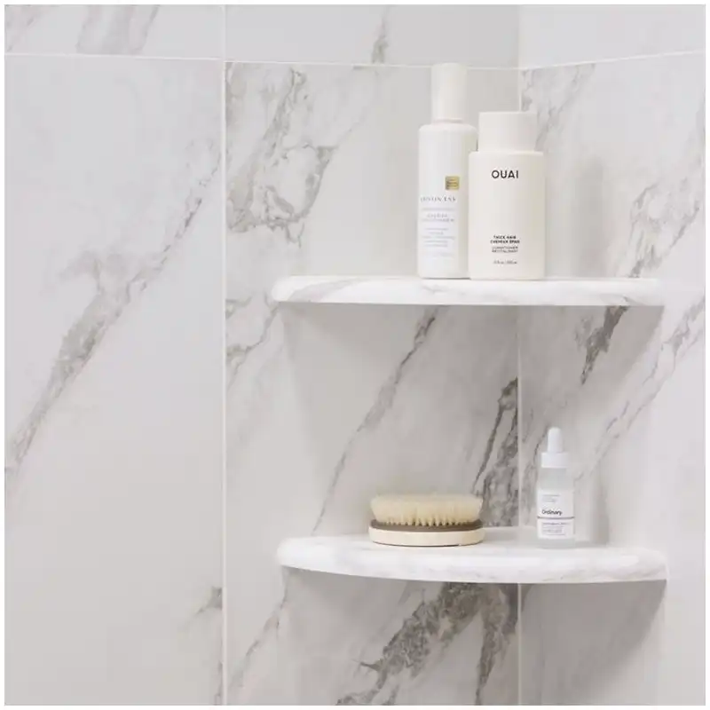 Volakas marble niche shelves with grey veins, polished edge, and drainage slope Volakas marble niche shelves with grey veins, polished edge, and drainage slope